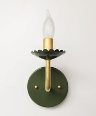 Olive and Brass feminine wall sconce with scalloped bobeche detail