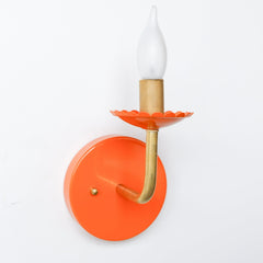 Orange and Brass wall sconce with scalloped edge bobeche