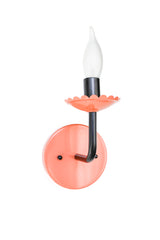 A candlestick wall sconce that brings color to a classic silhouette. The Adele Sconce pairs a coral powder-coated backplate and scalloped bobeche with a black metal arm and candle sleeve, a traditional shape with a colorful, grandmillennial twist. A great pick for a powder room, hallway, or bedside spot that wants a little warmth and personality.