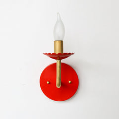 Red and Brass feminine wall sconce with scalloped bobeche detail