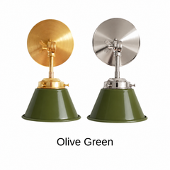 An olive green wall sconce with a glossy cone shade, shown in Olive Green with brass or nickel hardware. It has a single light, a round backplate, and a swivel knuckle with a wing nut so you can tilt the shade toward a bed, a desk, or a mirror. Use it as a bedside sconce, a reading light in a library or den, or a vanity light in a bathroom. Olive pairs well with cream plaster, leather, and warm brass, so it suits English country, vintage farmhouse, and earthy modern rooms.