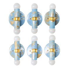 Six Celestial, Cream, and Gold hand-marbled Small Thalia Sconces shown on a white background to highlight the one-of-a-kind marbled pattern on each fixture. This petite two-light wall sconce has a soft blue, cream, and gold colorway that works beautifully in bathrooms, kids baths, powder rooms, cottage interiors, coastal decor, and grandmillennial spaces.