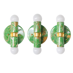 The marbled Thalia sconce in spring green, cream, and gold is a playful statement light that brings color, pattern, and personality to small spaces. Each fixture is hand-marbled, so no two are exactly alike, making every sconce feel like a little functional piece of art. This colorful wall light is especially good for bathroom vanities, powder rooms, hallways, and other compact spaces that need a cheerful pop. A great fit for dopamine decor, eclectic interiors, maximalist homes, and anyone looking for uniqu