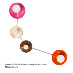 Colorblocked Aries wall sconce with four round saucer disc shades in doll pink, cream, fudge brown, and flame orange, connected by sleek chrome arms with white globe bulbs, photographed on a clean white background. Sculptural modern lighting for a pretty powder room, feminine bathroom vanity, eclectic bedroom, colorful hallway, mid century modern living room, or playful kids room, an instant pop of color for maximalist and modern decor.