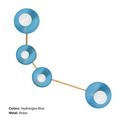 Aries zodiac wall sconce in Hydrangea Blue with warm brass hardware, constellation inspired modern wall light with four glossy powder coated steel disc shades and opal globe bulbs, sculptural statement sconce for a bathroom vanity over a mirror, powder room, entryway, bedside lighting, or colorful maximalist home decor, mid century modern brass and blue wall lighting that adds a bright saturated pop of color with a chic celestial vibe.