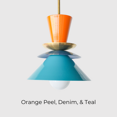 Colorblocked Astro Pendant light featuring bold, powdercoated aluminum shades in vibrant orange peel, rich denim blue, and saturated teal. Accented with a brass detail and suspended from a brass rod. This geometric ceiling light by Sazerac Stitches is handmade in New Orleans and ideal for maximalist, eclectic, or color-forward kitchen designs.