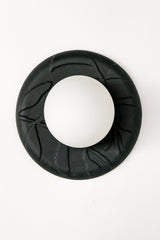 Front view of matte black unglazed porcelain sconce, leaf-textured ceramic backplate with frosted globe shade on white background