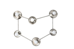 Six-light nickel wall sconce shaped like a constellation, with round nickel cups and white globe bulbs linked by thin nickel rods. The finish is a bright silver with some darker spots and wear, so it reads handmade rather than factory polished. Mount it on a wall over a bed or sofa, or on the ceiling as a flush mount light. The cool silver fits mid century modern and space age rooms, a celestial or zodiac themed bedroom, and modern spaces with chrome or steel accents.