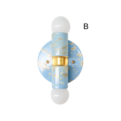 Celestial Blue, Cream, and Gold Marbled Small Thalia Sconce shown as a single product detail, featuring soft blue marbling, warm brass accents, and two white globe bulbs. This small decorative wall sconce adds personality without overwhelming a room, ideal for bathroom vanity lighting, powder rooms, children’s bathrooms, coastal decor, and grandmillennial interiors.