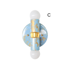 Single Celestial, Cream, and Gold hand-marbled Small Thalia Sconce photographed on a clean white background to show the glossy blue and gold patterning. Because each fixture is marbled by hand, every piece has its own variation, making it a special choice for colorful bathrooms, soft blue powder rooms, kids bath lighting, cottage decor, and playful traditional homes.