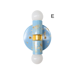 Celestial Blue, Cream, and Gold Marbled Small Thalia Sconce shown as a single product detail, featuring soft blue marbling, warm brass accents, and two white globe bulbs. This small decorative wall sconce adds personality without overwhelming a room, ideal for bathroom vanity lighting, powder rooms, children’s bathrooms, coastal decor, and grandmillennial interiors.