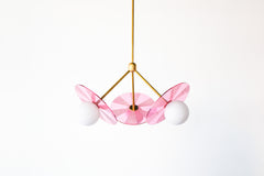 Pop art and Op-Art inspired pink acrylic and brass midcentury modern chandelier with etched acrylic discs