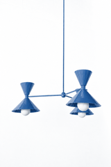 Denim blue is the easygoing, classic blue that makes a room feel fresh, friendly, and a little coastal, and this mid-century modern Clancy chandelier commits all the way, shades, arms, and stem in one glossy denim. Three double-cone bowtie shades radiate from a central sphere hub in a fun, sculptural MCM silhouette, throwing light up and down from each arm. It's built to be the star over a dining table, kitchen island, or entry, the kind of playful statement piece that makes people ask whose house this is. 