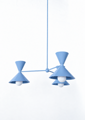 Soft powder blue is the color that makes a room feel calm, pretty, and a little coastal, and this mid-century modern Clancy chandelier commits all the way, shades, arms, and stem in one glossy hydrangea blue. Three double-cone bowtie shades radiate from a central sphere hub in a fun, sculptural MCM silhouette, throwing light up and down from each arm. It's built to be the star over a dining table, a bedroom, a nursery, or a breezy entry, the kind of playful statement piece that makes people ask whose house 
