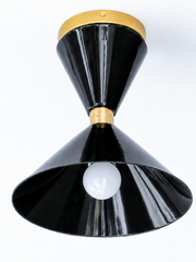 Glossy Black and Brass flushmount ceiling light in a mid-century modern style light fixture. Great for small spaces, to bring in a little more color and design. We love this in a brightly colored bathroom, a pantry, a statement closet, an art room and more!