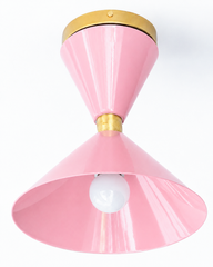 Blush Pink and Brass flushmount ceiling light in a mid-century modern style light fixture. Great for small spaces, to bring in a little more color and design. We love this in a brightly colored bathroom, a pantry, a statement closet, an art room and more!