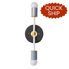 Quick ship colorblocked Thalia sconce in black, white, and gray with brass accents, modern two-light bathroom vanity wall light shown with quick ship badge
