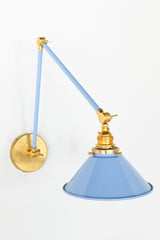 Pastel Blue & Brass adjustable cone sconce for kitchen lighting above windows or above open shelving cabinetry. Also makes a great bedside reading light that frees nightstand space. Available in 3 finishes and 30 colors. Available in neutrals or fun, bright colors that work in any maximalist or kid-friendly space. Classic style wall sconce that has been updated by our curated color palette of brights, darks, and pastel hues. Designed and made by Sazerac Stitches.