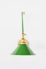 Bright Green and Brass adjustable cone sconce for kitchen lighting above windows or above open shelving cabinetry.  Also makes a great bedside reading light that frees up space on your nightstands. Comes in three finishes and over 30 colors for a custom look.  Available in neutrals or fun, bright colors that work in any maximalist or kid-friendly space.  Classic style wall sconce that has been updated by our curated color palette of brights, darks, and pastel hues.  Designed and made by Sazerac Stitches.