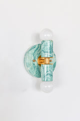 Teal and cream marbled statement sconce, Thalia two-light wall fixture with handmade swirled finish and modern shape, perfect for eclectic interiors, pastel bathrooms, and colorful home lighting lovers