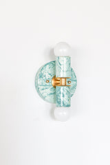 Teal and cream marbled Thalia sconce with ocean-inspired swirls, compact two-bulb wall fixture for bathroom vanity lighting, entryway walls, stairway lighting, or a pretty powder room with designer details