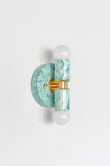 Modern teal and cream marbled wall light, Thalia sconce with glossy swirl pattern and clean graphic silhouette, great for coastal chic interiors, playful home decor, and high style lighting in small spaces