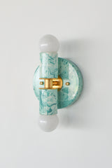 Teal and cream marbled two-light sconce with a bold swirled finish, compact Thalia wall light for a feminine bathroom, grandmillennial powder room, or maximalist interior that needs colorful statement lighting