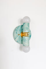Teal and cream marbled modern wall sconce, Thalia two-light fixture with glossy swirled pattern and metal accents, ideal for coastal bathroom decor, pastel interior design, or a chic powder room makeover