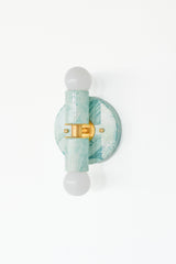 Teal and cream marbled modern wall sconce, Thalia two-light fixture with glossy swirled pattern and metal accents, ideal for coastal bathroom decor, pastel interior design, or a chic powder room makeover