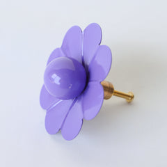 Add a pop of personality to your decor with the Orchid Daisy Knob by Sazerac Stitches. This beautiful floral drawer pull in a rich orchid shade features layered petals and a rounded center, creating a bold, vintage-inspired accent that’s perfect for brightening up cabinets or drawers in any room.