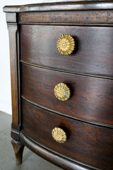 Dark wood antique nightstand with cast brass floral drawer pulls