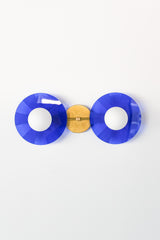 Statement lighting for modern interiors: The eye-catching Circus Sconce by Sazerac Stitches in bright blue and brass