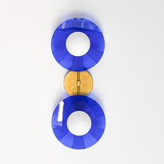 Statement lighting for modern interiors: The eye-catching Circus Sconce by Sazerac Stitches in bright blue and brass