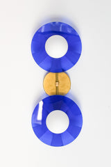 Statement lighting for modern interiors: The eye-catching Circus Sconce by Sazerac Stitches in bright blue and brass