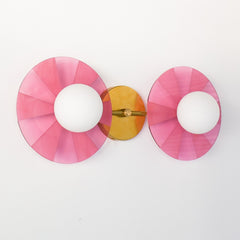 Modern colorful light fixture: The Circus Sconce in pink & Brass