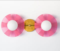 Modern colorful light fixture: The Circus Sconce in pink & Brass