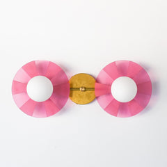 Modern colorful light fixture: The Circus Sconce in pink & Brass