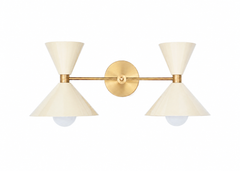 Cream and brass mid-century modern style two light bathroom vanity wall sconce with oversized cone shades. Add a pop of color, match a colorful wallpaper, or make a kids bathroom high-end and colorful with the Double Clancy wall sconce by Sazerac Stitches. The glossy soft cream color works beautifully with neutrals, other bright colors and more!