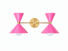 Bright Doll Pink & Brass double cone wall sconce with brass arm and round brass backplate, a modern mid century inspired bathroom vanity light with two sculptural powder coated metal shades and exposed globe bulbs, bold colorful wall lighting for maximalist interiors, powder rooms, kids bathrooms, nurseries, and playful contemporary design. Beautiful jewel-tone light fixture.