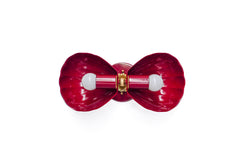 Double Coquille wall sconce in glossy Black Cherry, a deep wine-red finish that reads like lacquered candy. Two sculptural scallop shells frame the bulbs and create a symmetrical, Art Deco silhouette, with warm brass details at the center for a hint of vintage glamour. Shot straight-on against a clean white background, this image is ideal for searches like shell sconce, scallop shell wall light, coastal glam lighting, boutique hotel bathroom sconce, statement powder room lighting, and colorful brass wall sc
