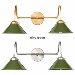 An olive green two-light gooseneck wall sconce with glossy cone shades, shown in Olive Green with brass or nickel hardware. It has two curved gooseneck arms joined by a straight crossbar at a round backplate, so it sits wide like a vanity light. Hang it over a bathroom mirror, above a kitchen sink, or in a mudroom. Olive pairs well with cream plaster, leather, and warm brass, so it suits English country, vintage farmhouse, and earthy modern rooms.
