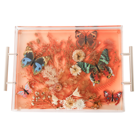 Floral Tray with translucent orange color, neutral florals, and colorful butterflies