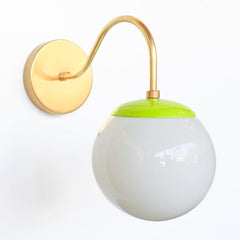 Brass and Chartreuse Mid Century modern style wall sconce with white globe shade