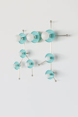 Fresh, bright, and unmistakably unique, the Poolside and chrome Gemini One is a modern zodiac-inspired wall fixture designed after the Gemini constellation. The pale aqua tone brings a soft pop of color, while the chrome structure keeps the overall look sleek and contemporary. This statement sconce is ideal for anyone drawn to quirky designer lighting, celestial decor, maximalist touches, playful modern style, or unexpected wall art. It fits naturally in children’s bedrooms, reading nooks, bathrooms, hallwa