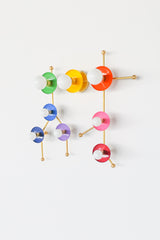Shaped like the Gemini star constellation, this Rainbow Gemini One sconce combines bold color with warm brass hardware for a look that feels whimsical, modern, and artistic. The rainbow palette gives it a joyful pop-art energy, while the constellation layout makes it a natural fit for astrology lovers, zodiac-obsessed decorators, and anyone drawn to unusual statement lighting. It works beautifully in a playful bedroom, a creative kid’s space, a cheerful hallway, or any maximalist interior that needs a color