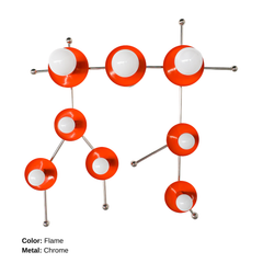 The Flame and Chrome Gemini One sconce is a bold, constellation-inspired wall light designed to echo the shape of the Gemini zodiac sign. This sculptural fixture features vivid flame-orange metal discs paired with polished chrome arms and white globe bulbs, creating a graphic, celestial silhouette that feels both playful and modern. Shown here in a studio setting against a clean white background, this colorful statement sconce works beautifully in eclectic interiors, maximalist spaces, creative studios, kid