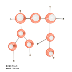 The Peach and Chrome Gemini One sconce is a bold, constellation-inspired wall light designed to echo the shape of the Gemini zodiac sign. This sculptural fixture features vivid flame-orange metal discs paired with polished chrome arms and white globe bulbs, creating a graphic, celestial silhouette that feels both playful and modern. Shown here in a studio setting against a clean white background, this colorful statement sconce works beautifully in eclectic interiors, maximalist spaces, creative studios, kid
