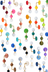 Proof that lighting doesn't have to be beige. The handmade Ida sconce comes in a full rainbow of powder-coated colors — from hot pink, red, and orange to teal, green, navy, and soft neutrals — each paired with a warm brass arm and a frosted glass globe. Whether you're after a bold statement for a powder room or a soft tone-on-tone for a nursery, there's a colorway for it. A maximalist, made-to-order pick for colorful traditional, grandmillennial, and eclectic homes that reject the safe answer.