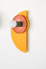 Mustard, Peach, and Olive Colorblocked geometric wall sconce with bold colors. Colorful Eclectic light fixture
