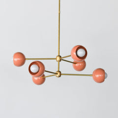 Brass and Peach Mid century modern style dining room or living room chandelier.  Fun way to add color to any space.